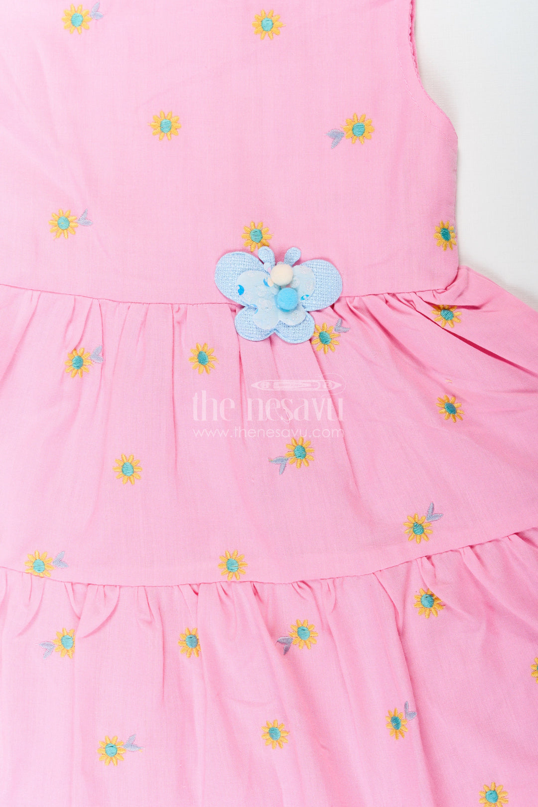 The Nesavu Baby Cotton Frocks Girls Cotton Embroidered Cinderellas Pink Dress with Ruffled Hem and Daisy Motifs Nesavu Nesavu Girls Cinderellas Pink Dress Daisy Embroidery Ruffled Hem Cotton Fabric