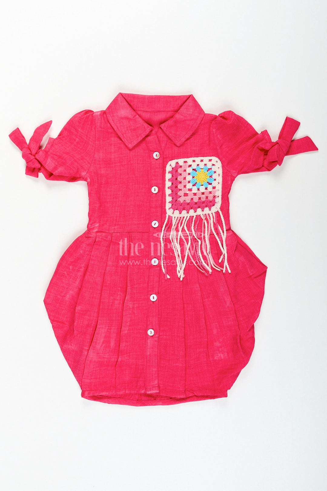 The Nesavu Girls Cotton Frock Girls cotton frock with collar and crochet patch for casual outings Nesavu Nesavu girls cotton frock in bright pink with crochet embellished pocket and collar