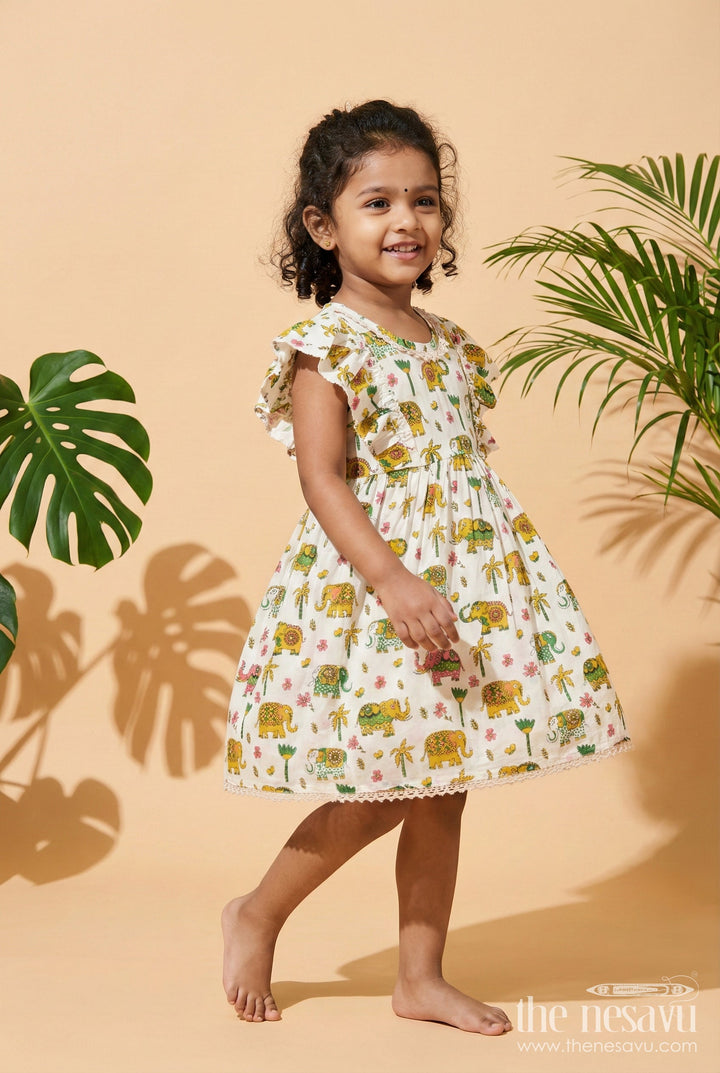 The Nesavu Girls Cotton Frock Girls Cotton Frock with Elephant Print for Zoo Visits and Playful Days Nesavu 16 (1Y) / Multicolor GFC2053A-16 Nesavu cotton frock for girls with multicolor elephant print and flutter sleeves – ideal for playful days