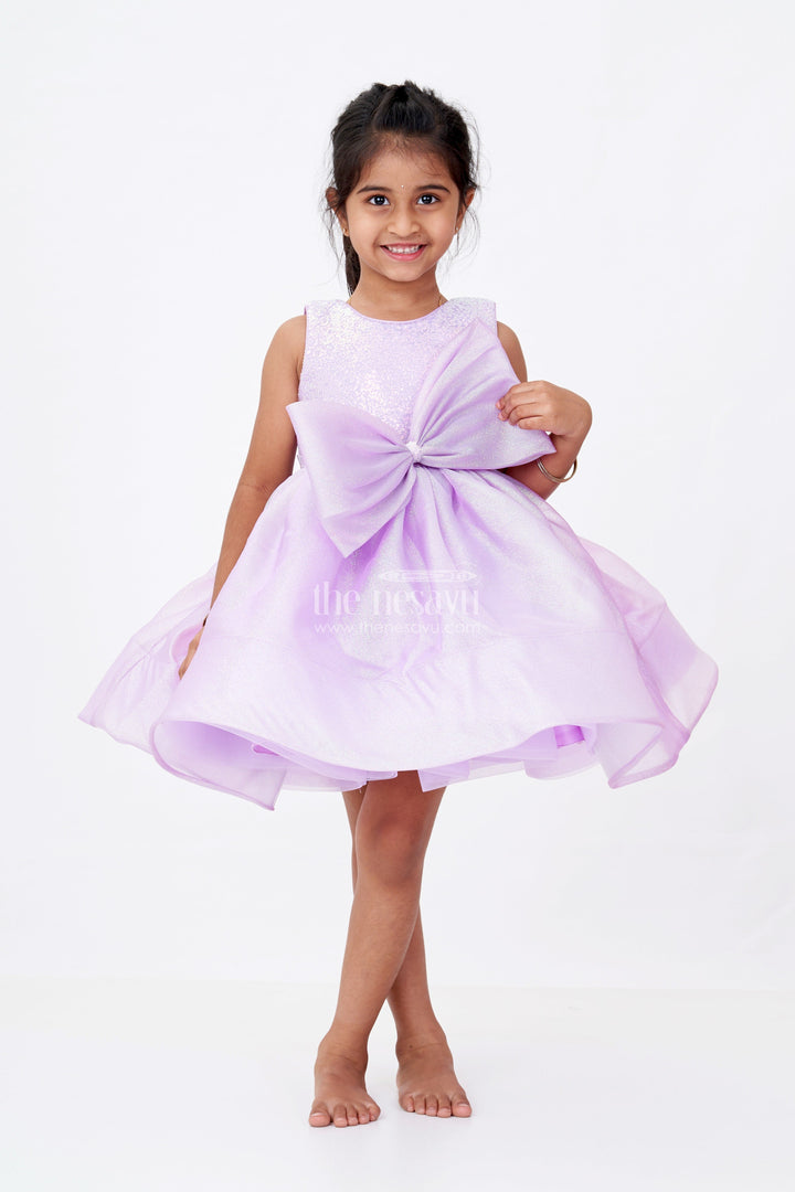 The Nesavu Girls Fancy Party Frock Girls Cotton Party Wear Frock in Lavender Organza with Giant Bow and Glittery Flared Silhouette Nesavu 16 (1Y) / Purple PF201C-16 Nesavu Girls Cotton Party Wear Frock Lavender Organza Glitter Finish Oversized Bow