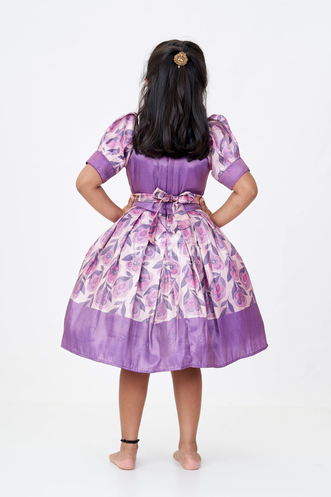 The Nesavu Silk Frock Girls Cotton Silk Frock in Rich Purple Jacquard with Floral Border and Embellished Neckline Nesavu Nesavu Girls Cotton Silk Frock Purple Jacquard Floral Print Border Embellished Neckline