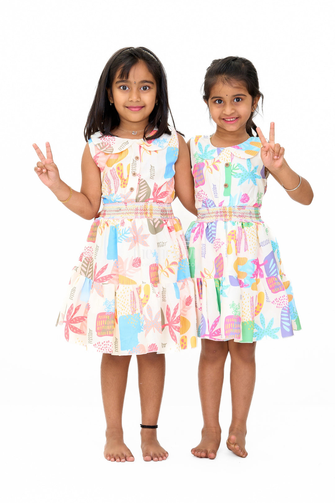 The Nesavu Girls Cotton Frock Girls Cotton Sleeveless Frock with Vibrant Prints and Peter Pan Collar Nesavu Nesavu Girls Cotton Sleeveless Frock Smocked Bodice Vibrant Prints
