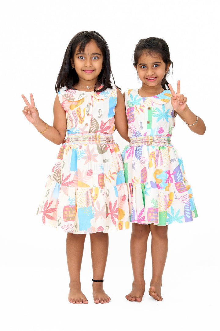 The Nesavu Girls Cotton Frock Girls Cotton Sleeveless Frock with Vibrant Prints and Peter Pan Collar Nesavu Nesavu Girls Cotton Sleeveless Frock Smocked Bodice Vibrant Prints