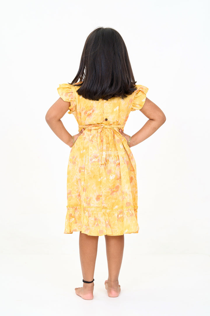 The Nesavu Girls Cotton Frock Girls Cotton Summer Dress for Babies with Yellow and Orange Floral Prints Nesavu Nesavu Girls Cotton Summer Dress Babies Floral Prints Ruffled Hem