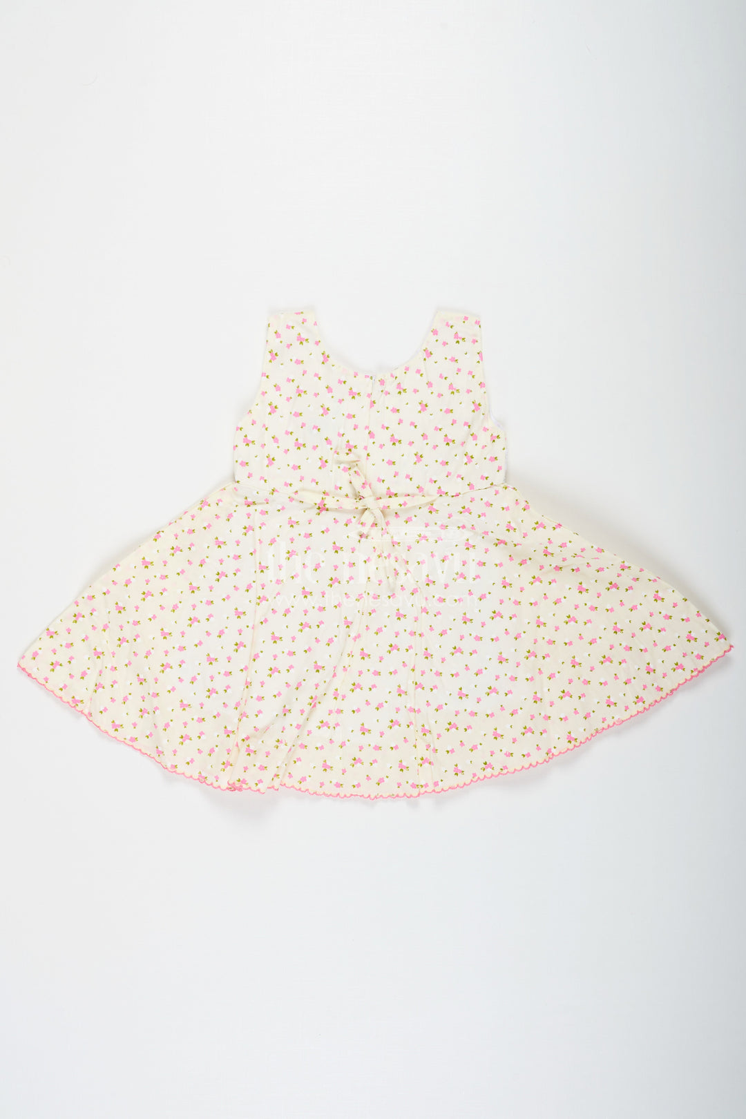 The Nesavu Baby Cotton Frocks Girls Cream Soft Cotton Dresses Online with Allover Floral Print and Lace Bow Waist Detail Nesavu Nesavu Soft Cotton Dresses Online Girls Allover Floral Print Lace Waist Bow Detail