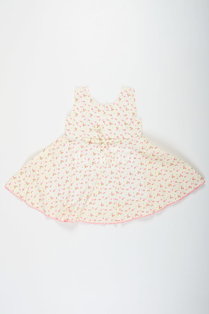 The Nesavu Baby Cotton Frocks Girls Cream Soft Cotton Dresses Online with Allover Floral Print and Lace Bow Waist Detail Nesavu Nesavu Soft Cotton Dresses Online Girls Allover Floral Print Lace Waist Bow Detail