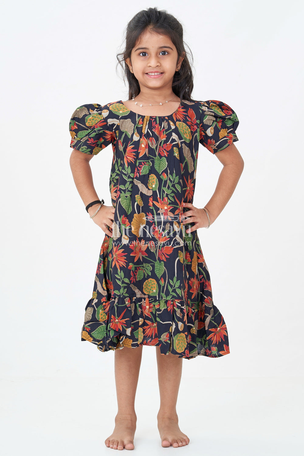 The Nesavu Girls Fancy Frock Girls Cute Party Frocks in Black Modal Silk with Nature Inspired Digital Print and Ruffled Bottom Nesavu Nesavu Black Modal Silk Cute Party Frocks Nature Inspired Digital Print Ruffled Hem