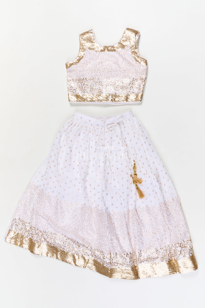 The Nesavu Girls Ethnic Lehenga Girls Ethnic Lehenga Set with Sequin Blouse for Weddings and Receptions Nesavu 24 (5Y) / White / Poly Silk GL861A-24 Nesavu girls poly silk lehenga set with sequin blouse and tassel dupatta for weddings and festive occasions