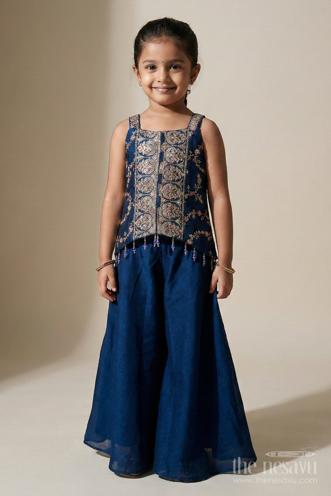 The Nesavu Girls Sharara / Plazo Set Girls Festive Plazo Set with Embroidered Blouse and Tassel Dupatta Nesavu Nesavu girls embroidered sharara set with mirror yoke and dupatta for festivals and functions