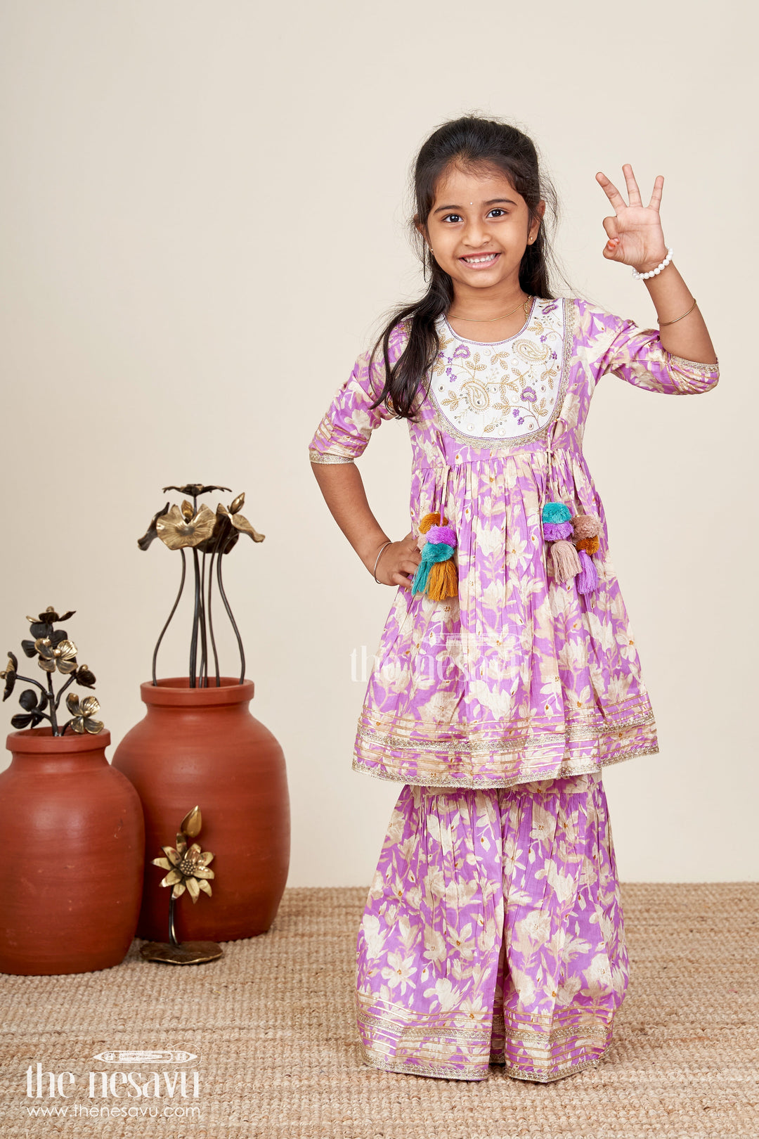 The Nesavu Girls Sharara / Plazo Set Girls floral sharara set with embellished neckline and gota lace Nesavu Nesavu girls floral cotton sharara set embellished neckline tassels  festive wear Navratri
