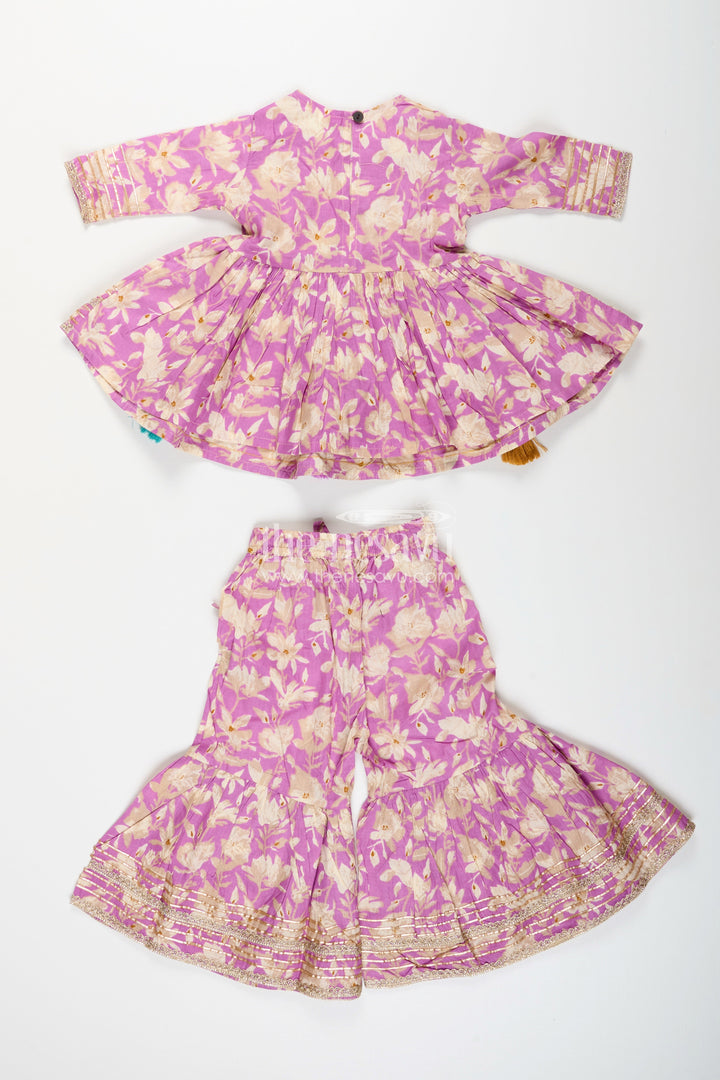 The Nesavu Girls Sharara / Plazo Set Girls floral sharara set with embellished neckline and gota lace Nesavu Nesavu girls floral cotton sharara set embellished neckline tassels  festive wear Navratri