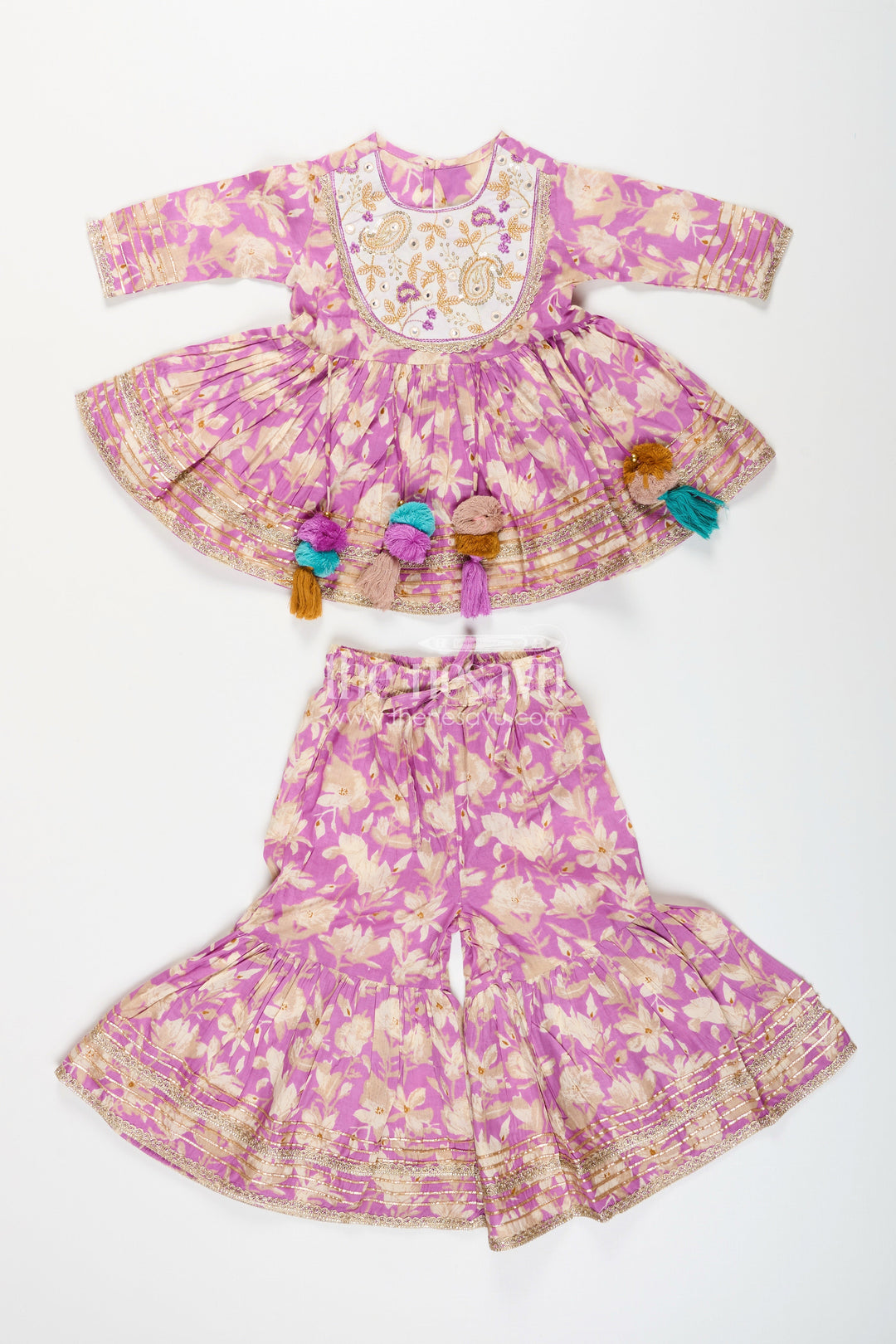 The Nesavu Girls Sharara / Plazo Set Girls floral sharara set with embellished neckline and gota lace Nesavu Nesavu girls floral cotton sharara set embellished neckline tassels  festive wear Navratri