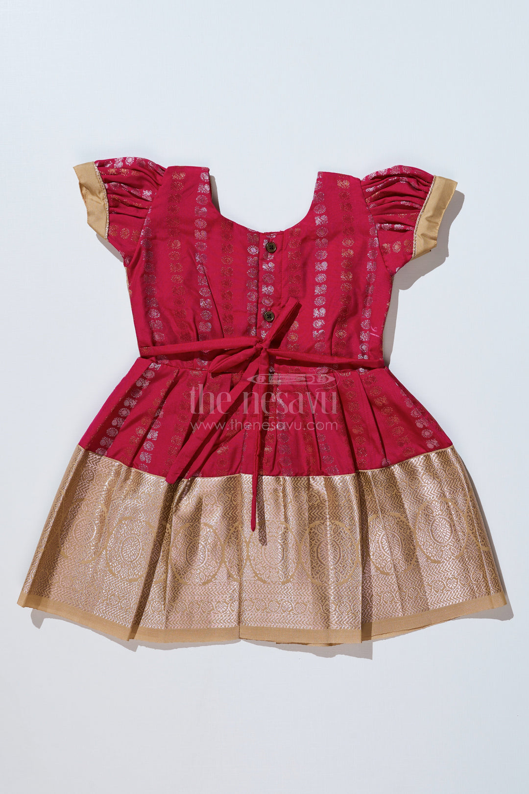 The Nesavu Girls Kanchi Silk Frock Girls Gold and Red Pattu Pavadai with Intricate Zari Border and Elegant Pleated Design Nesavu Nesavu Girls Gold Red Pattu Pavadai Intricate Zari Border Elegant Pleated Design