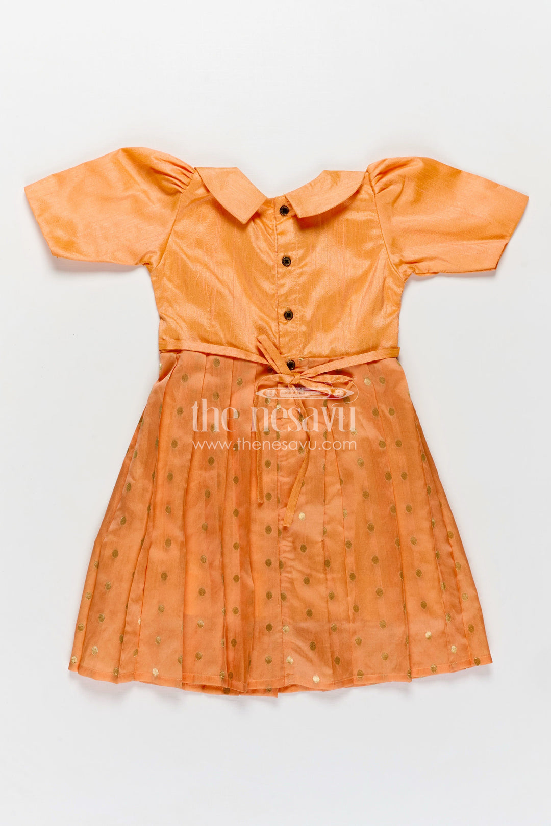 The Nesavu Silk Frock Girls Golden Silk Frock in Raw Silk with Peter Pan Collar and Semi Banarasi Woven Bottom Nesavu Nesavu Girls Golden Silk Frock Raw Silk Banarasi Bottom Peter Pan Collar Detail