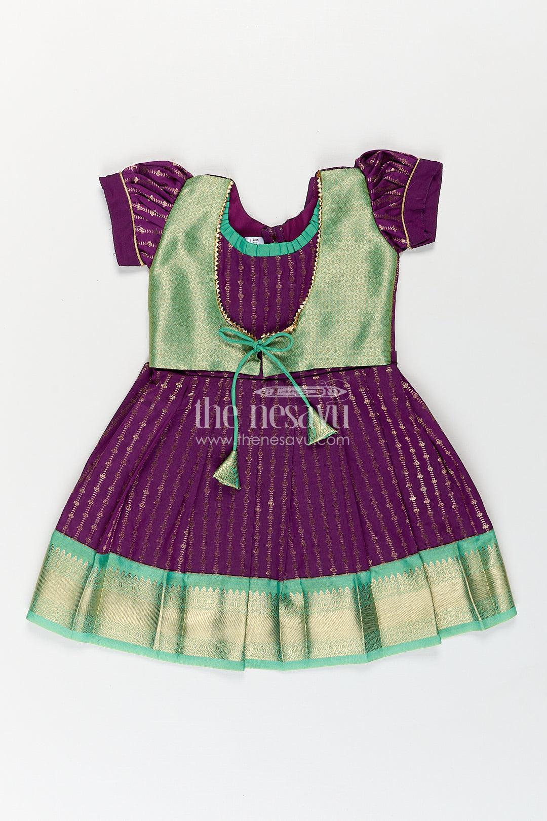 The Nesavu Girls Kanchi Silk Frock Girls Kanchivaram Long Green Frock with Puff Sleeves in Purple and Zari Woven Skirt and Overlay Detail Nesavu 14 (6M) / Green / Style 6 SF862AF-14 Nesavu Girls Long Green Frock Kanchivaram Silk Purple Bodice Zari Woven Pleated Skirt
