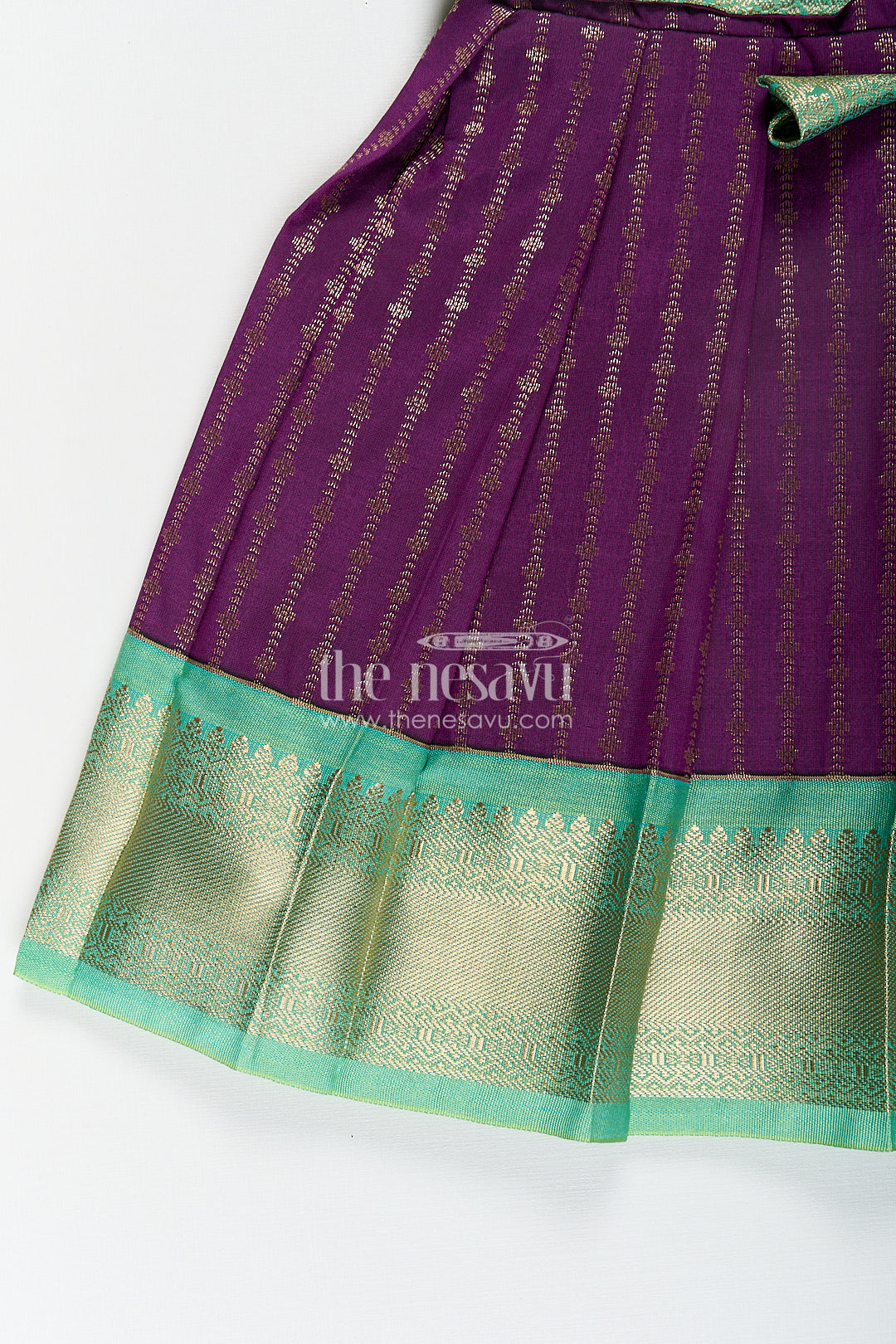The Nesavu Girls Kanchi Silk Frock Girls Kanchivaram Long Green Frock with Puff Sleeves in Purple and Zari Woven Skirt and Overlay Detail Nesavu Nesavu Girls Long Green Frock Kanchivaram Silk Purple Bodice Zari Woven Pleated Skirt