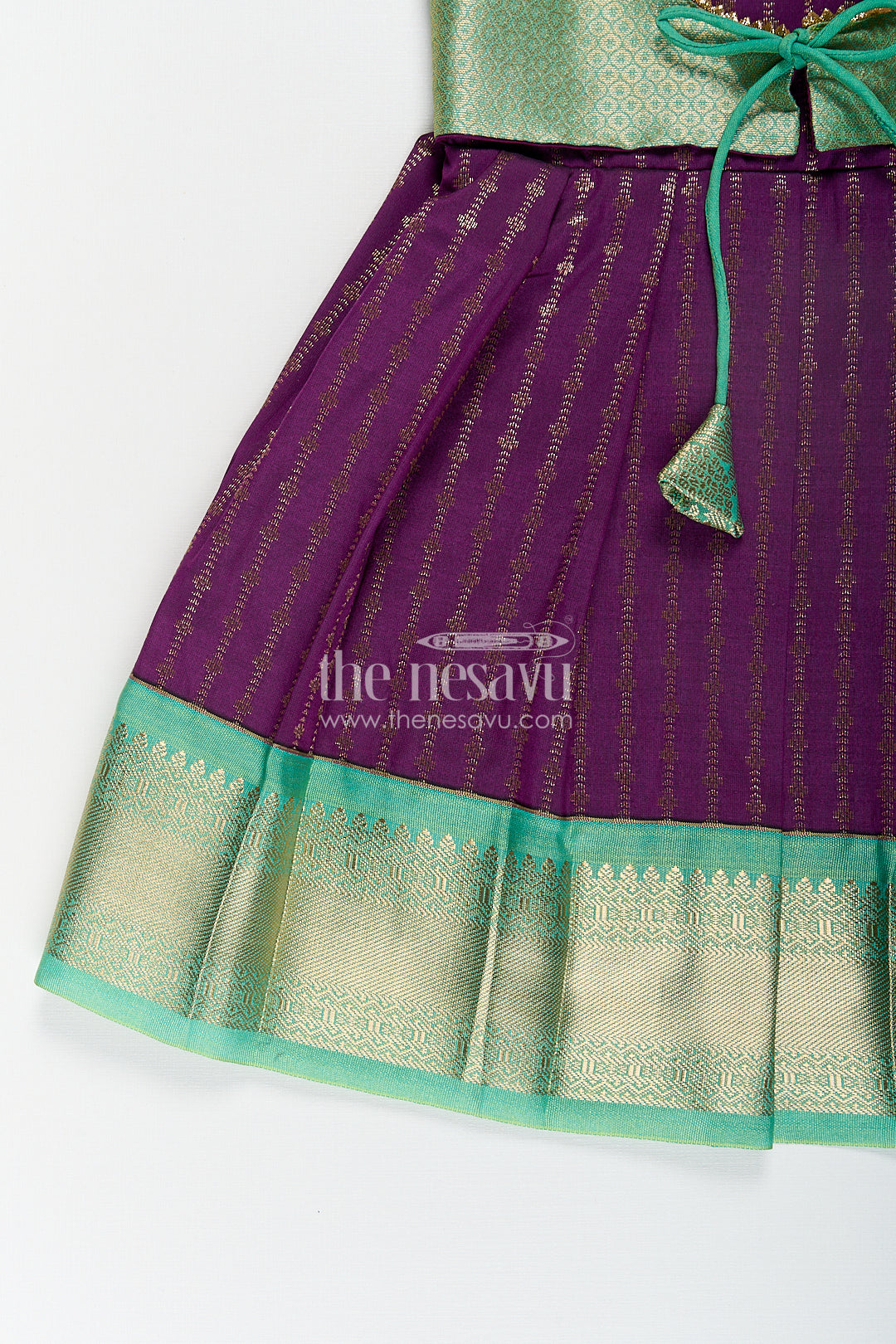 The Nesavu Girls Kanchi Silk Frock Girls Kanchivaram Long Green Frock with Puff Sleeves in Purple and Zari Woven Skirt and Overlay Detail Nesavu Nesavu Girls Long Green Frock Kanchivaram Silk Purple Bodice Zari Woven Pleated Skirt