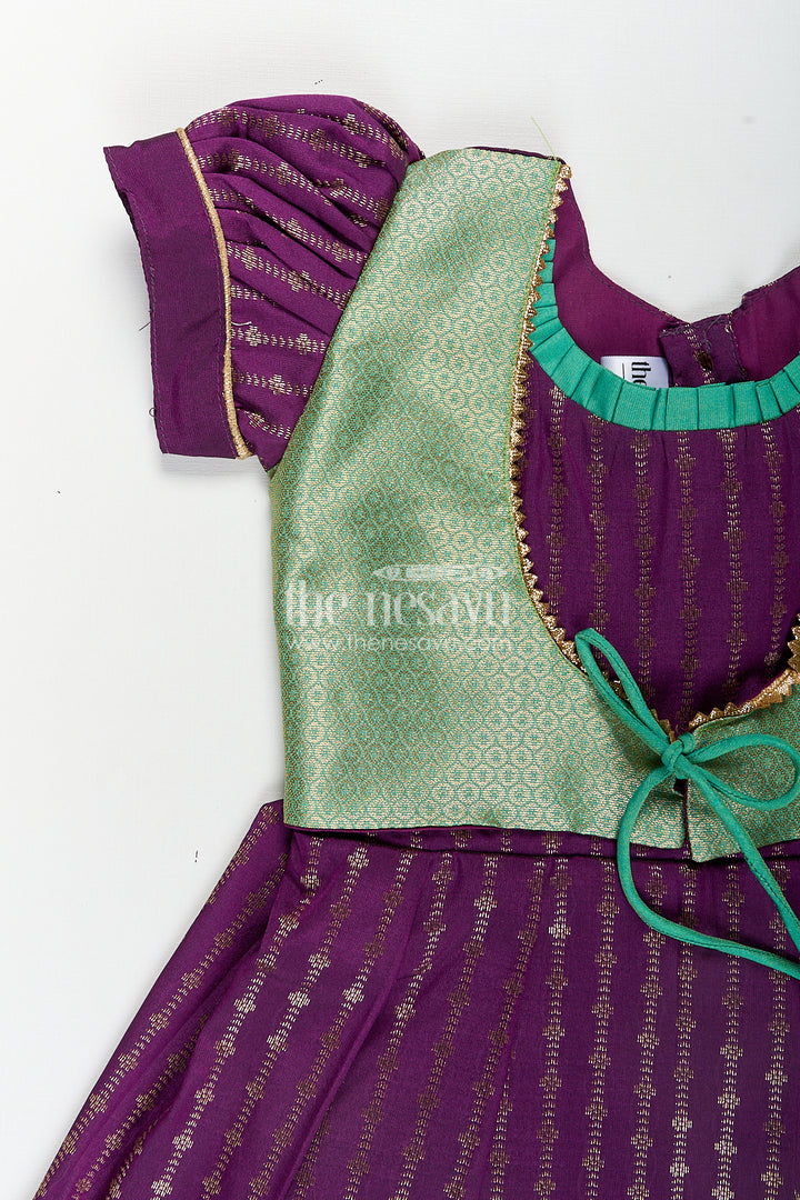 The Nesavu Girls Kanchi Silk Frock Girls Kanchivaram Long Green Frock with Puff Sleeves in Purple and Zari Woven Skirt and Overlay Detail Nesavu Nesavu Girls Long Green Frock Kanchivaram Silk Purple Bodice Zari Woven Pleated Skirt