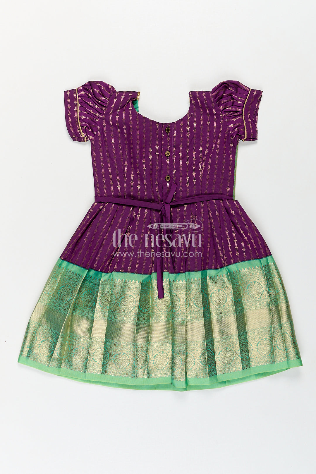 The Nesavu Girls Kanchi Silk Frock Girls Kanchivaram Long Green Frock with Puff Sleeves in Purple and Zari Woven Skirt and Overlay Detail Nesavu Nesavu Girls Long Green Frock Kanchivaram Silk Purple Bodice Zari Woven Pleated Skirt