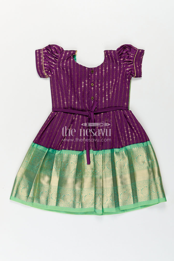 The Nesavu Girls Kanchi Silk Frock Girls Kanchivaram Long Green Frock with Puff Sleeves in Purple and Zari Woven Skirt and Overlay Detail Nesavu Nesavu Girls Long Green Frock Kanchivaram Silk Purple Bodice Zari Woven Pleated Skirt