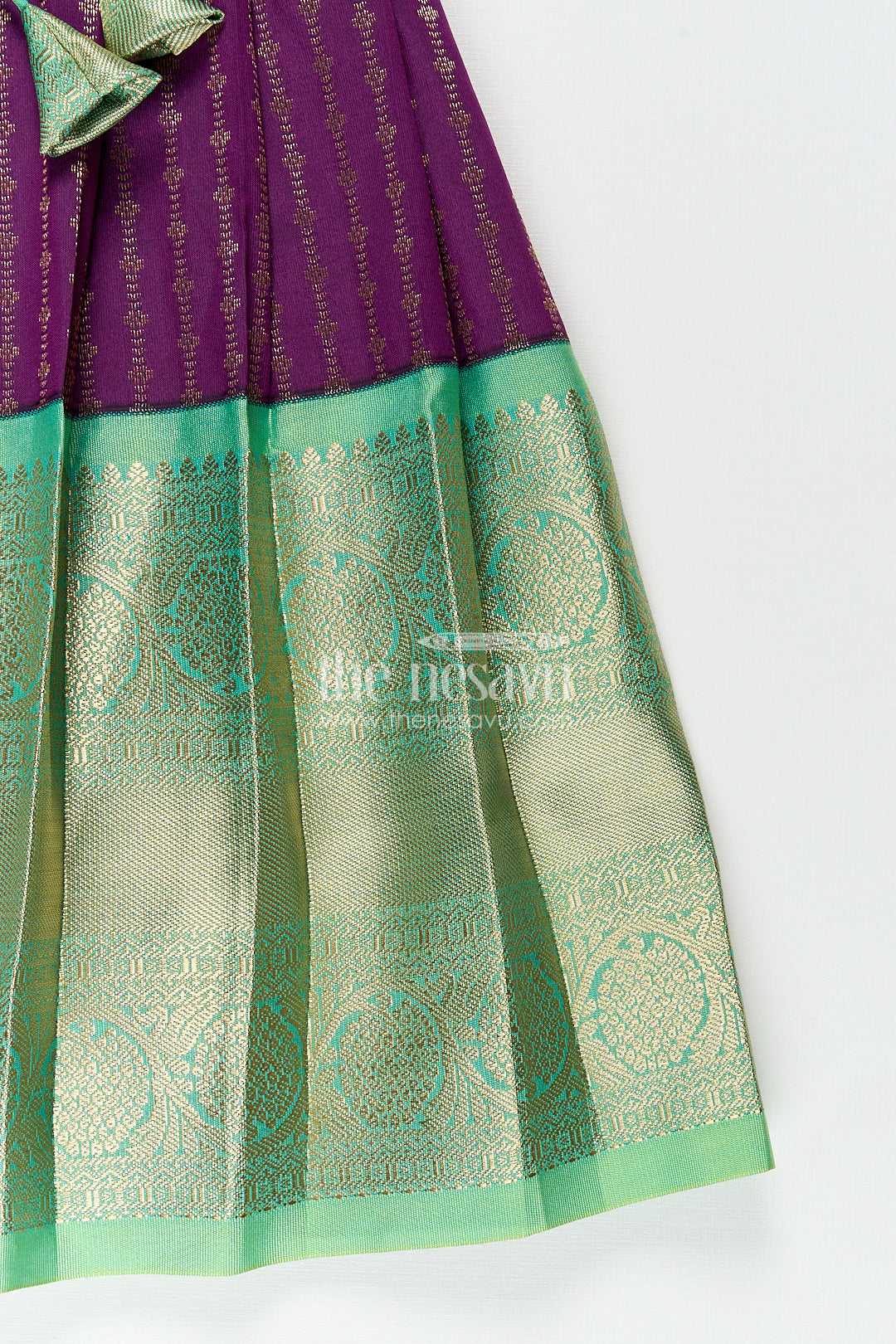 The Nesavu Girls Kanchi Silk Frock Girls Kanchivaram Long Green Frock with Puff Sleeves in Purple and Zari Woven Skirt and Overlay Detail Nesavu Nesavu Girls Long Green Frock Kanchivaram Silk Purple Bodice Zari Woven Pleated Skirt