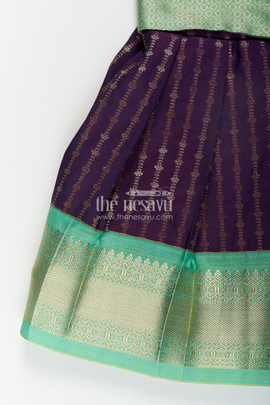 The Nesavu Girls Kanchi Silk Frock Girls Kanchivaram Long Green Frock with Puff Sleeves in Purple and Zari Woven Skirt and Overlay Detail Nesavu Nesavu Girls Long Green Frock Kanchivaram Silk Purple Bodice Zari Woven Pleated Skirt