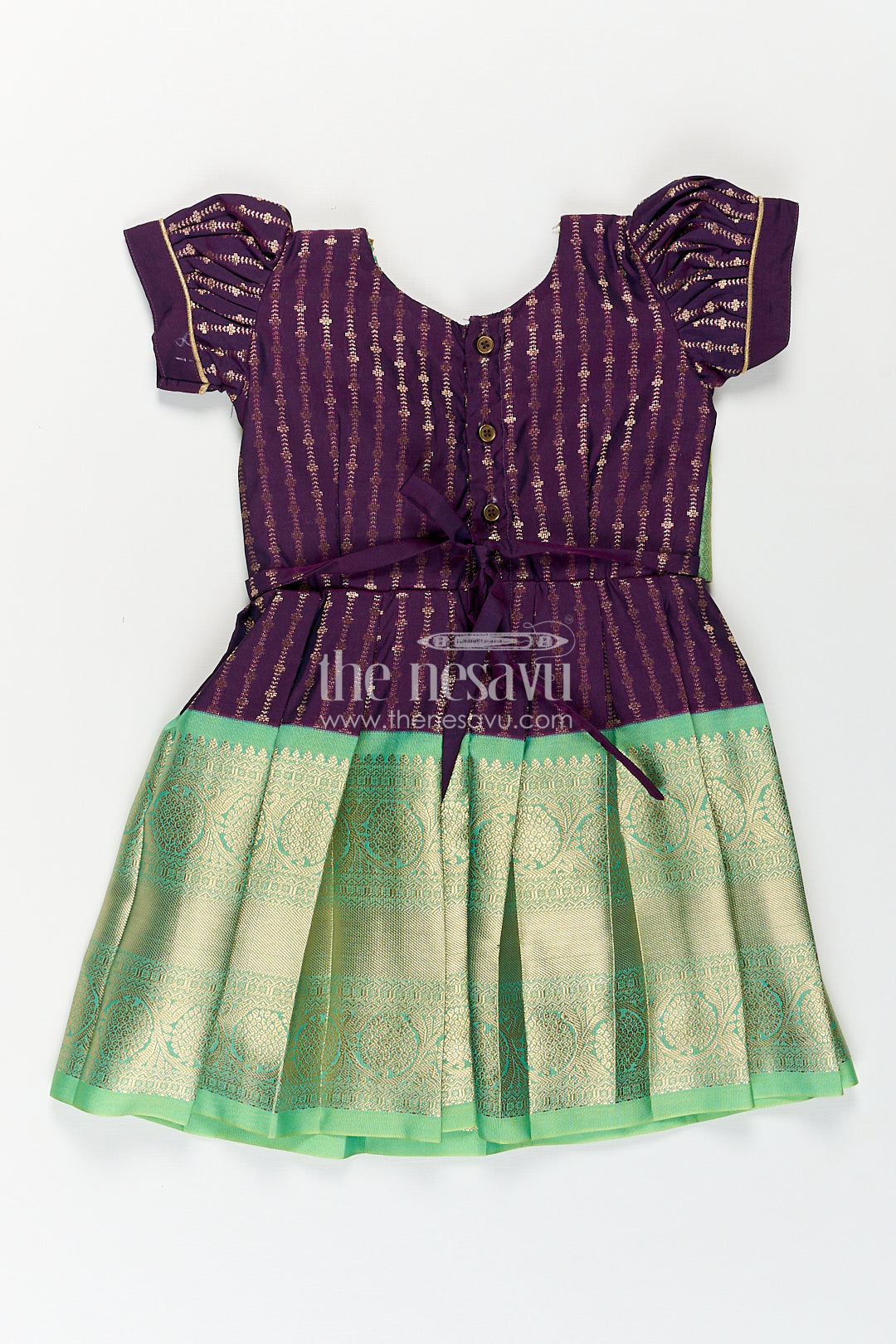 The Nesavu Girls Kanchi Silk Frock Girls Kanchivaram Long Green Frock with Puff Sleeves in Purple and Zari Woven Skirt and Overlay Detail Nesavu Nesavu Girls Long Green Frock Kanchivaram Silk Purple Bodice Zari Woven Pleated Skirt