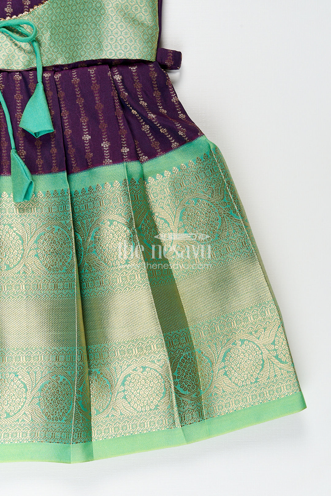 The Nesavu Girls Kanchi Silk Frock Girls Kanchivaram Long Green Frock with Puff Sleeves in Purple and Zari Woven Skirt and Overlay Detail Nesavu Nesavu Girls Long Green Frock Kanchivaram Silk Purple Bodice Zari Woven Pleated Skirt