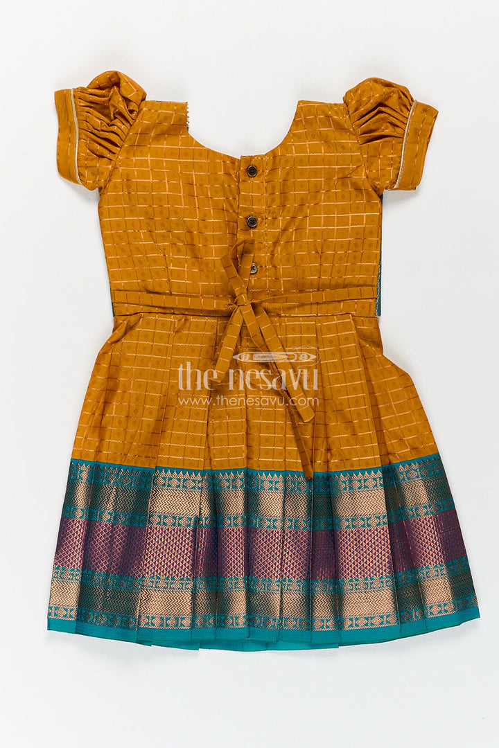 The Nesavu Girls Kanchi Silk Frock Girls Kanchivaram Orange Silk Frocks with Puff Sleeves Green Zari Overlay and Traditional Woven Border Nesavu Nesavu Girls Orange Silk Frocks Kanchivaram Style Green Zari Yoke Traditional Woven Hemline