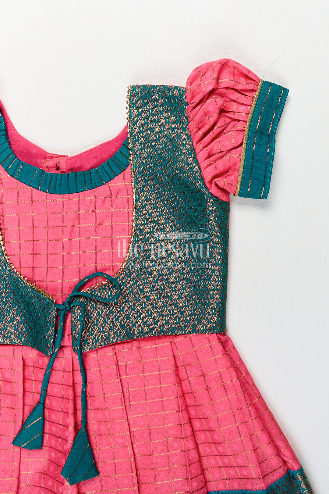 The Nesavu Girls Kanchi Silk Frock Girls Kanchivaram Pink Silk Dress with Puff Sleeves and Green Zari Overlay for Traditional Celebrations Nesavu Nesavu Girls Pink Silk Dress Kanchivaram Style Green Zari Bodice Puff Sleeves