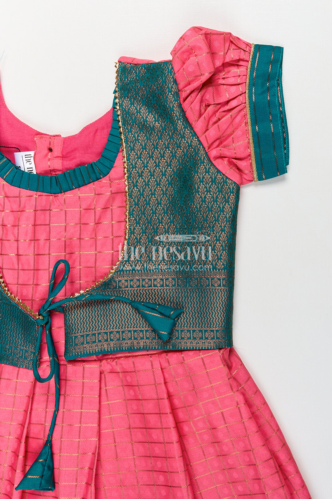The Nesavu Girls Kanchi Silk Frock Girls Kanchivaram Pink Silk Dress with Puff Sleeves and Green Zari Overlay for Traditional Celebrations Nesavu Nesavu Girls Pink Silk Dress Kanchivaram Style Green Zari Bodice Puff Sleeves