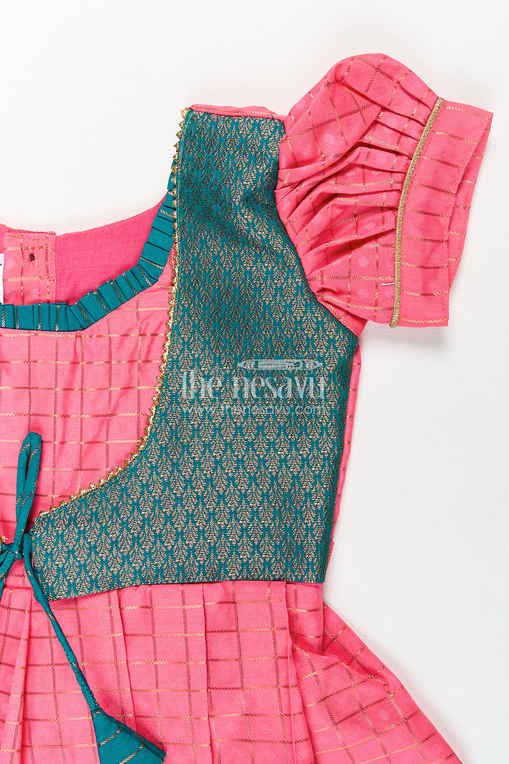 The Nesavu Girls Kanchi Silk Frock Girls Kanchivaram Pink Silk Dress with Puff Sleeves and Green Zari Overlay for Traditional Celebrations Nesavu Nesavu Girls Pink Silk Dress Kanchivaram Style Green Zari Bodice Puff Sleeves