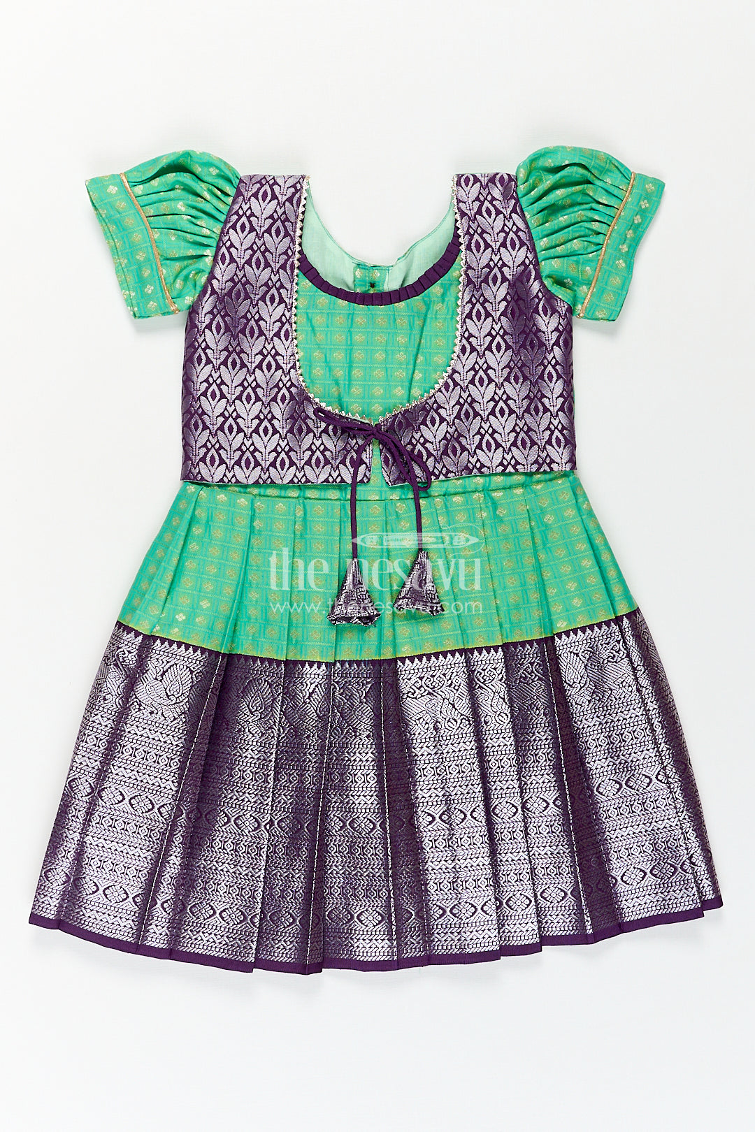 The Nesavu Girls Kanchi Silk Frock Girls Kanchivaram Silk Cotton Frocks with Puff Sleeves Green Bodice and Purple Zari Woven Skirt Nesavu 16 (1Y) / Green / Style 1 SF824AA-16 Nesavu Girls Silk Cotton Frocks Kanchivaram Style Purple Zari Skirt Green Puff Sleeve Bodice