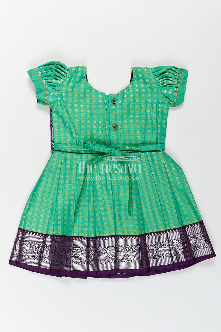 The Nesavu Girls Kanchi Silk Frock Girls Kanchivaram Silk Cotton Frocks with Puff Sleeves Green Bodice and Purple Zari Woven Skirt Nesavu Nesavu Girls Silk Cotton Frocks Kanchivaram Style Purple Zari Skirt Green Puff Sleeve Bodice