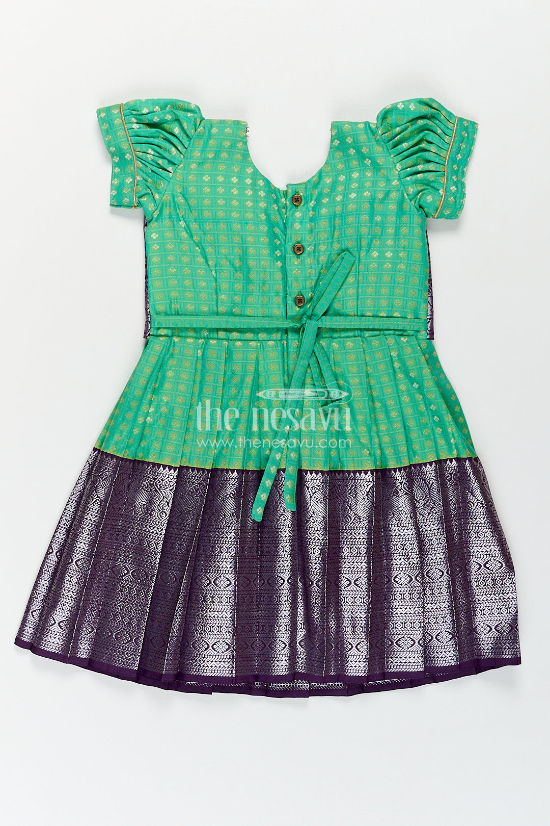 The Nesavu Girls Kanchi Silk Frock Girls Kanchivaram Silk Cotton Frocks with Puff Sleeves Green Bodice and Purple Zari Woven Skirt Nesavu Nesavu Girls Silk Cotton Frocks Kanchivaram Style Purple Zari Skirt Green Puff Sleeve Bodice