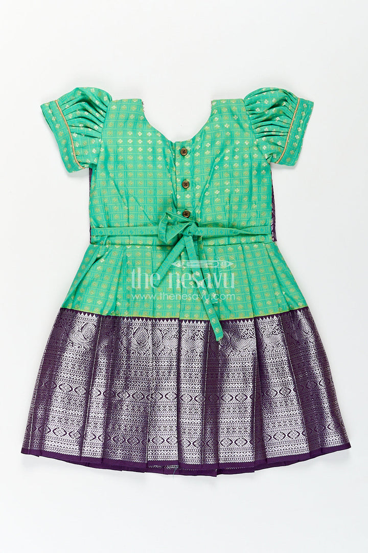 The Nesavu Girls Kanchi Silk Frock Girls Kanchivaram Silk Cotton Frocks with Puff Sleeves Green Bodice and Purple Zari Woven Skirt Nesavu Nesavu Girls Silk Cotton Frocks Kanchivaram Style Purple Zari Skirt Green Puff Sleeve Bodice