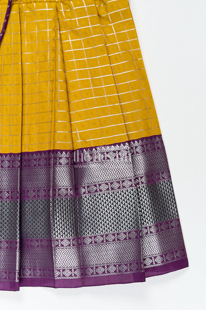 The Nesavu Girls Kanchi Silk Frock Girls Kanchivaram Traditional Dress Frock in Mustard Yellow with Puff Sleeves and Purple Zari Border Nesavu Nesavu Girls Traditional Dress Frock Kanchivaram Silk Mustard Purple Zari Border Detailing