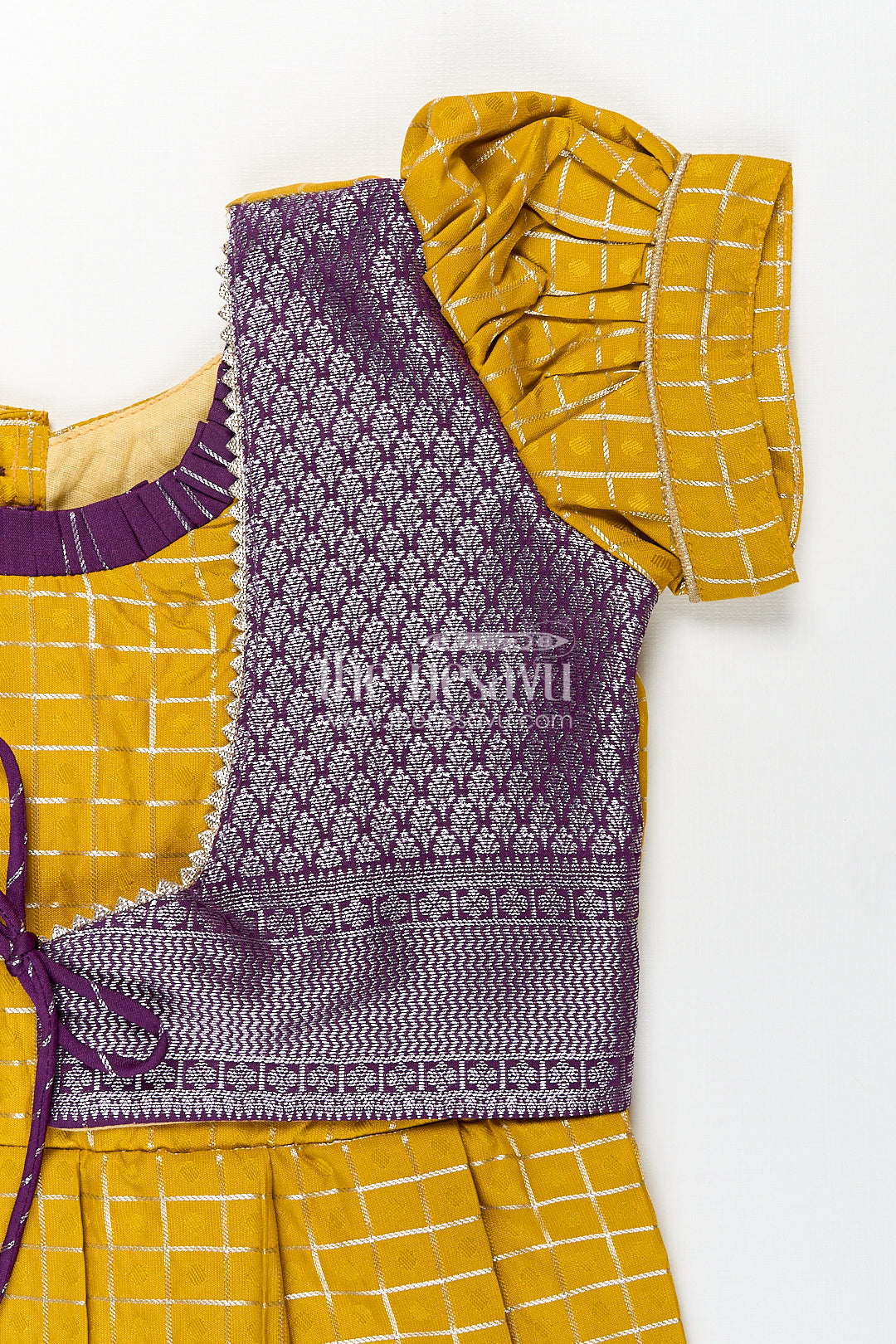 The Nesavu Girls Kanchi Silk Frock Girls Kanchivaram Traditional Dress Frock in Mustard Yellow with Puff Sleeves and Purple Zari Border Nesavu Nesavu Girls Traditional Dress Frock Kanchivaram Silk Mustard Purple Zari Border Detailing
