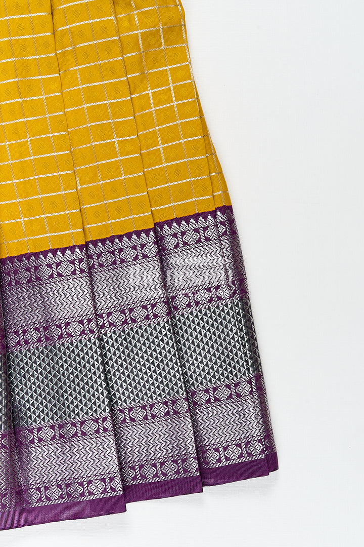 The Nesavu Girls Kanchi Silk Frock Girls Kanchivaram Traditional Dress Frock in Mustard Yellow with Puff Sleeves and Purple Zari Border Nesavu Nesavu Girls Traditional Dress Frock Kanchivaram Silk Mustard Purple Zari Border Detailing