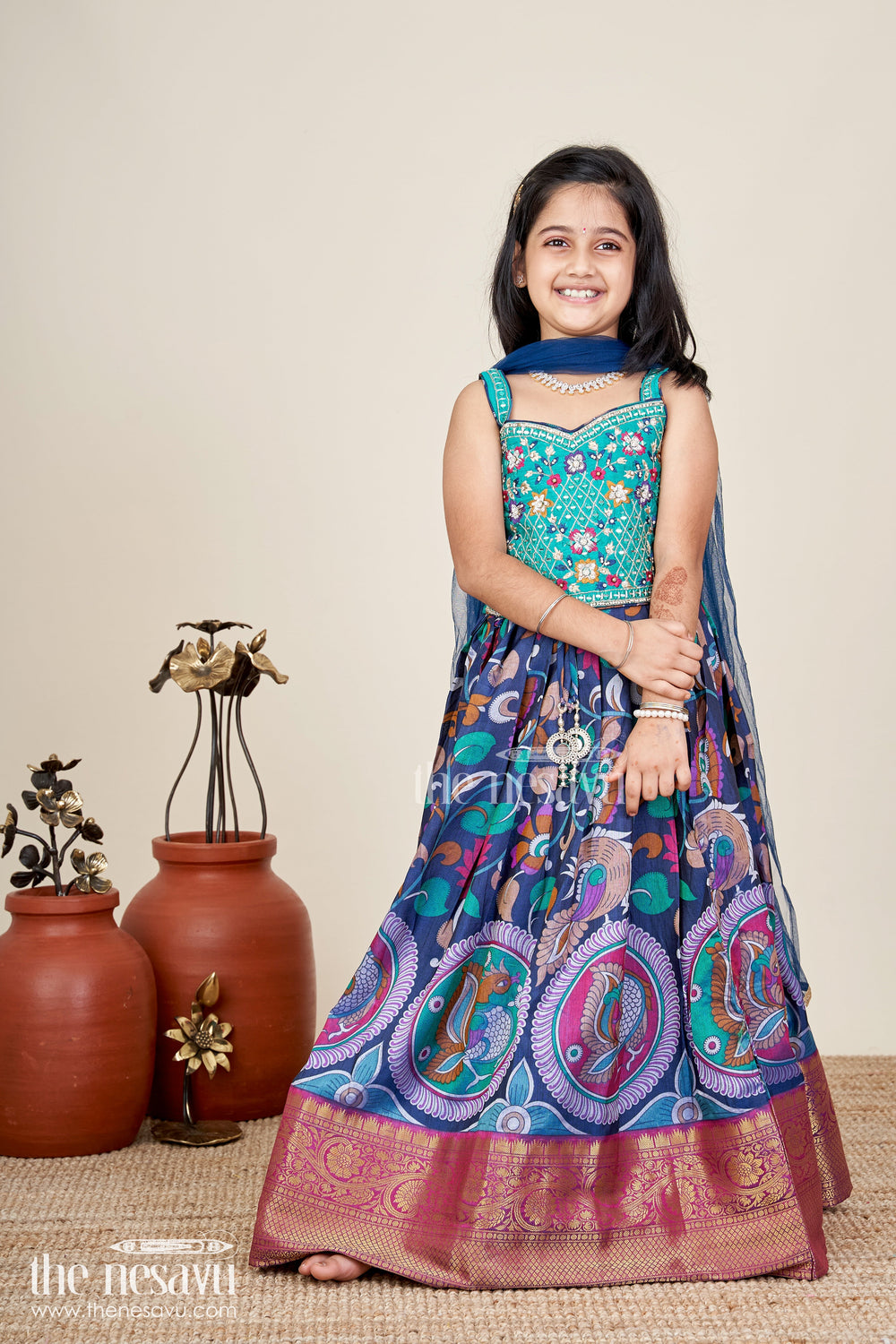 The Nesavu Girls Lehenga Choli Girls lehenga trendy with Semi Silk Printed Skirt and Mirror Embroidered Choli in Peacock Motif Nesavu Nesavu Girls Peacock Print Lehenga Semi Silk Mirror Work Blouse lehenga trendy Style