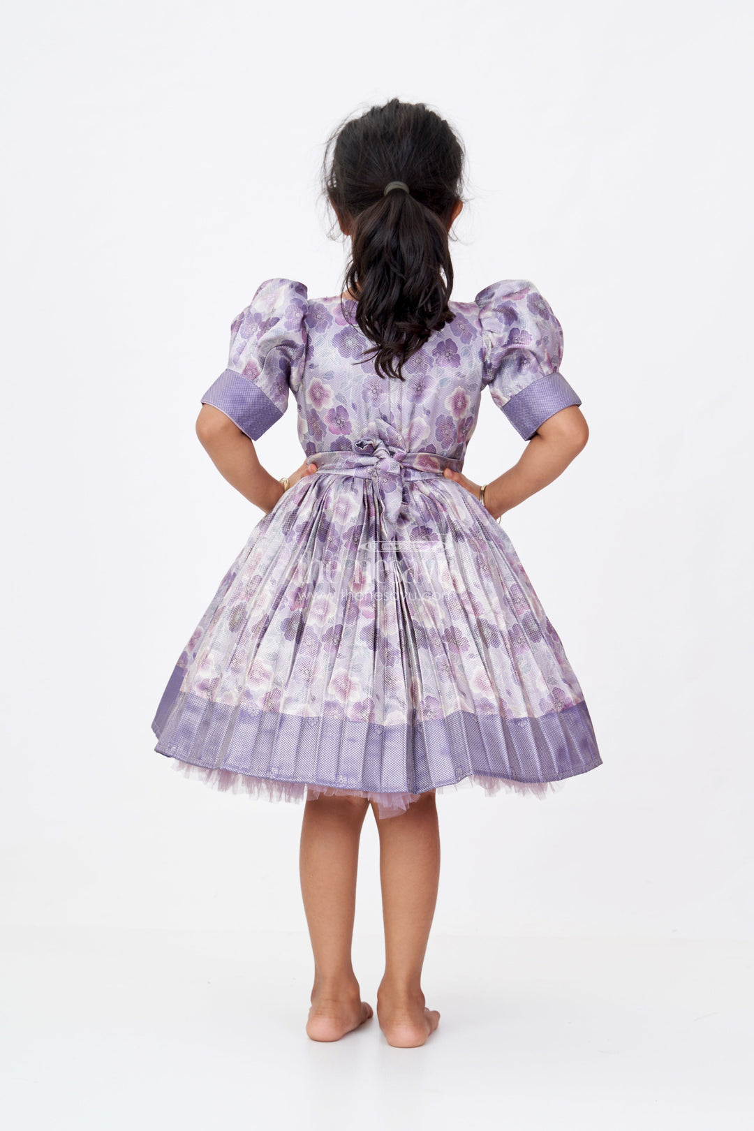 The Nesavu Silk Frock Girls Light Purple Colour Frock with Floral Digital Print and Puff Sleeves for Festive Wear Nesavu Nesavu Girls Light Purple Colour Silk Frock Floral Digital Print Puff Sleeves Festive Wear