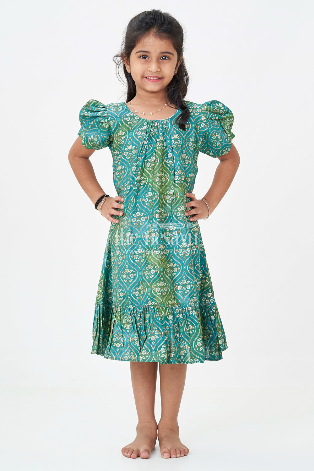 The Nesavu Girls Fancy Frock Girls Long Frock New Model in Green Modal Silk with Ornamental Digital Print and Puff Sleeves Nesavu Nesavu Green Modal Silk Long Frock New Model Ruffle Hem Puff Sleeves Girls