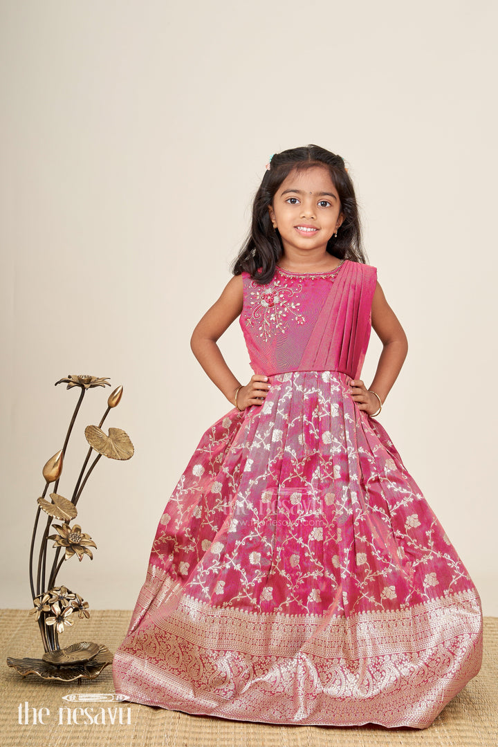 The Nesavu Girls Silk Gown Girls magenta Kora tissue silk Anarkali with big zari border Nesavu Nesavu girls magenta Kora tissue silk Anarkali with big zari border festive ethnic dress