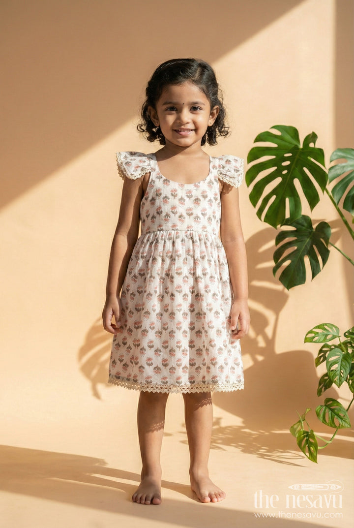 The Nesavu Girls Cotton Frock Girls Multicolor Cotton Frock with Strappy Sleeves for Summer Playdates Nesavu 16 (1Y) / Multicolor GFC2054A-16 Nesavu multicolor floral cotton frock for girls with ruffle straps – perfect for garden parties and play