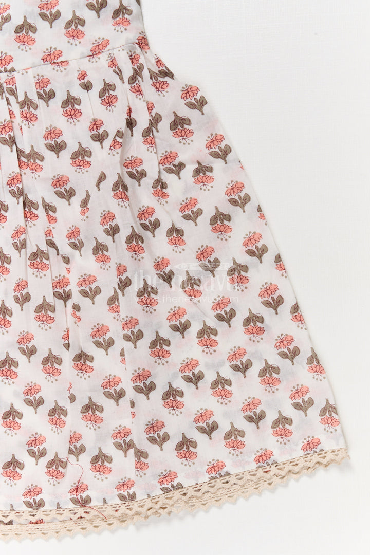 The Nesavu Girls Cotton Frock Girls Multicolor Cotton Frock with Strappy Sleeves for Summer Playdates Nesavu Nesavu multicolor floral cotton frock for girls with ruffle straps – perfect for garden parties and play