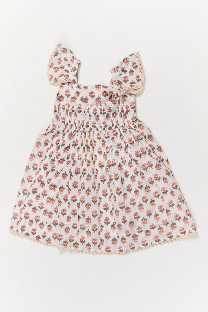 The Nesavu Girls Cotton Frock Girls Multicolor Cotton Frock with Strappy Sleeves for Summer Playdates Nesavu Nesavu multicolor floral cotton frock for girls with ruffle straps – perfect for garden parties and play