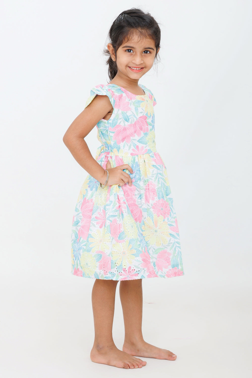 The Nesavu Girls Cotton Frock Girls Multicolor Floral Frock with Flutter Sleeves for Casual and Outdoor Events Nesavu Nesavu Girls Multicolor Cotton Floral Frock Flutter Sleeves Summer Casual Events
