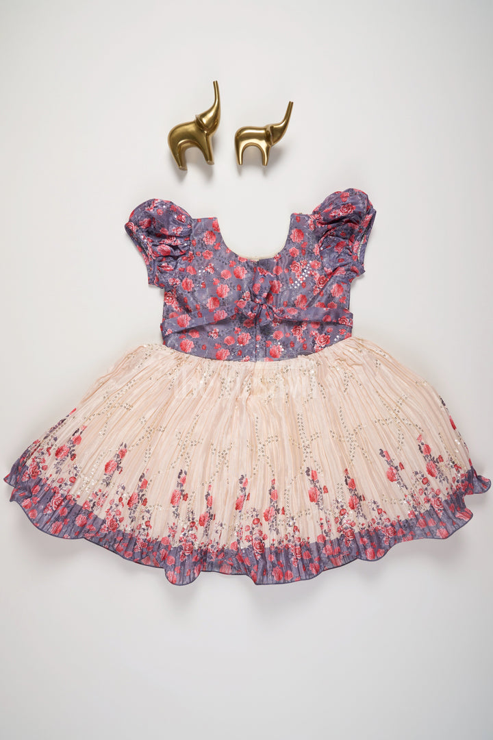 The Nesavu Silk Party Frock Girls Multicolor Floral Silk Party Frock with Puff Sleeves and Pleated Skirt Nesavu Nesavu Multicolor Floral Silk Party Frock Puff Sleeves Embellished Waistline Girls