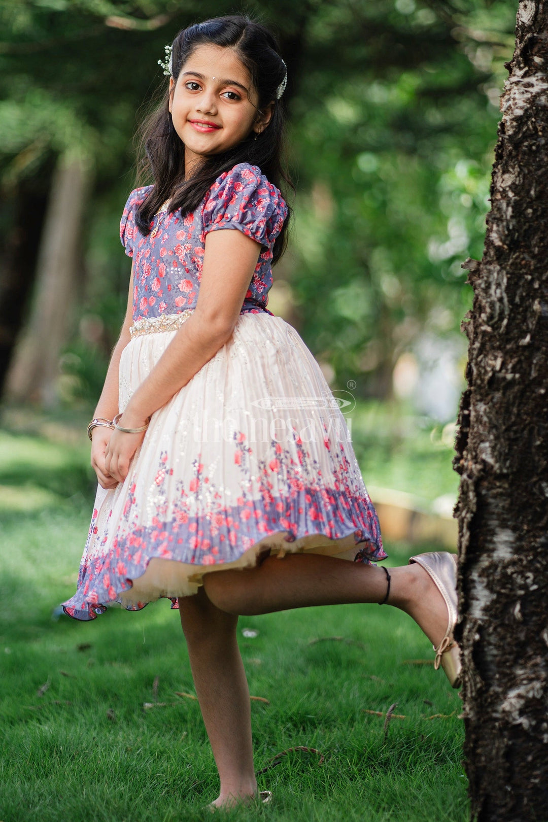 The Nesavu Silk Party Frock Girls Multicolor Floral Silk Party Frock with Puff Sleeves and Pleated Skirt Nesavu Nesavu Multicolor Floral Silk Party Frock Puff Sleeves Embellished Waistline Girls