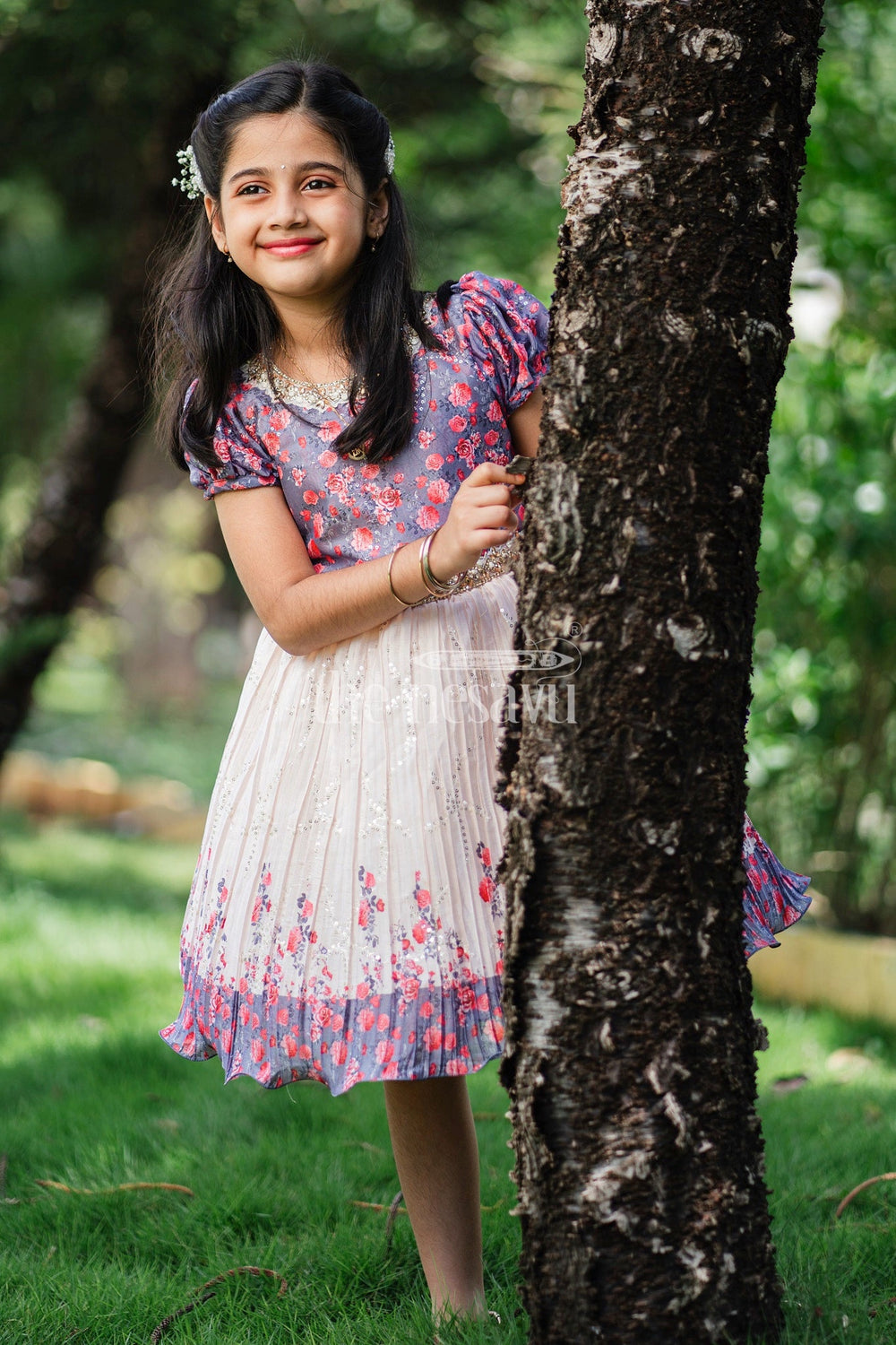 The Nesavu Silk Party Frock Girls Multicolor Floral Silk Party Frock with Puff Sleeves and Pleated Skirt Nesavu Nesavu Multicolor Floral Silk Party Frock Puff Sleeves Embellished Waistline Girls